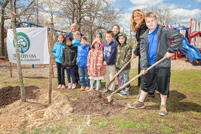 Freeholder Deputy Director Serena DiMaso celebrates Arbor Day by planting a tree with West Belmar Elementary School on April 24 in Wall, NJ.
